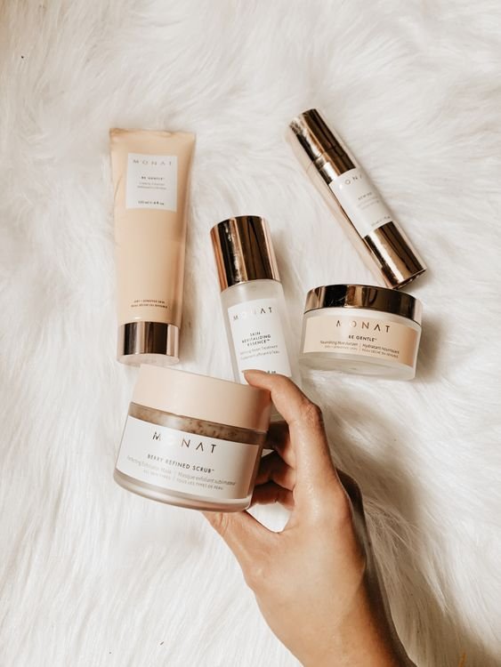 Elegant Korean skincare bottles arranged on a marble surface